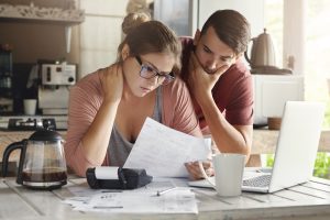 Couple looking at a credit card bill